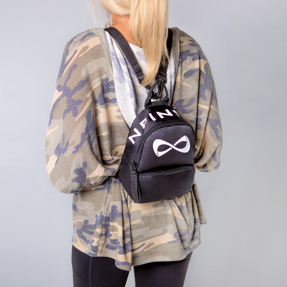 Girl with Nfinity backpack uk. Mini purse backpack
